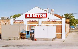the new rear entrance and neon sign of Ariston Cafe facing 1940 US66