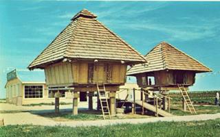 Asian Arts Route 66 Towanda color postcard photo; 1966. Store, and two thatched roofed buildings by US66