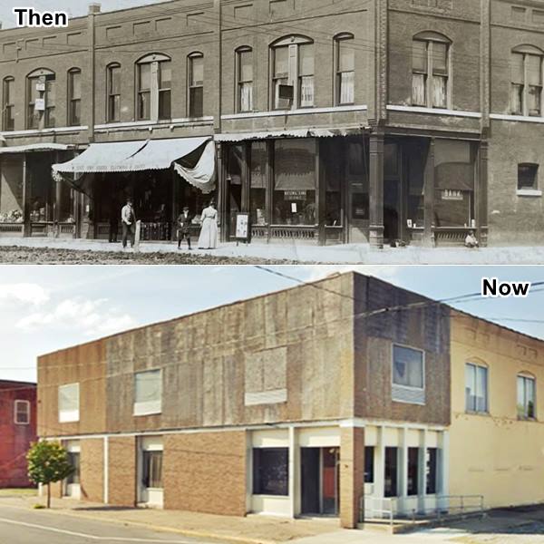 combined image: top a 1913 black and white photo of a two story building with stores on ground floor, people and dirt street, bottom: same spot now, a vacant brick building with boarded windows