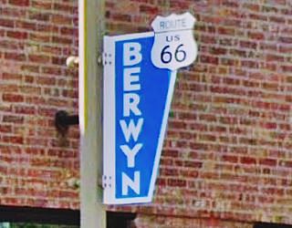 US 66 Berwyn shields along Ogden Ave Route 66 shield and BERWYN in white on blue background. A sign