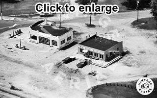 1980 aerial view Braidwood Sinclair and Weitz Cafe black and white 1980 aerial photo gas station and laundromat, cars, gas pumps