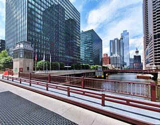 Route 66 Drawbridge, Chicago Bridge building by drawbridge deck, Chicago river below, skyscrapers around it