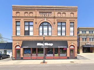 two story red-brick building facing Route 66