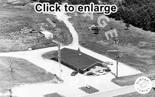 Davito’s Motel 1971. Braidwood Davitos Motel gable roof, single story behind pependicular to street, black and white 1971 aerial photo