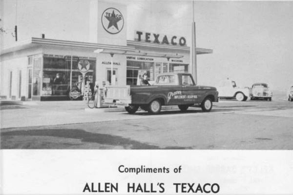 black and white 1965 yearbook picture Texaco station, pickup truck parked by pumps