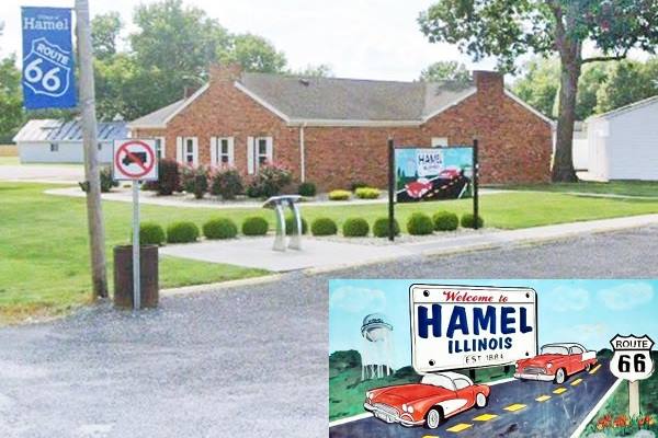 gravel parking area, stainless steel lectern-like marker and a color billboard, lawn and house behind. Inset shows the billboard clearly