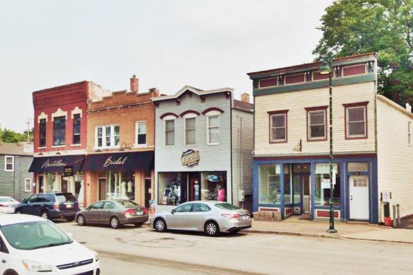 Lemont Downtown Historic District color, Main St. in Lemont with woodframe commercial buildings 2 stories, facing it