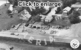 Humble Enco station 1965 Gardner IL black and white 1968 aerial photo of a T intersection, US66 runs across, a gas station on the upper side of the intersection
