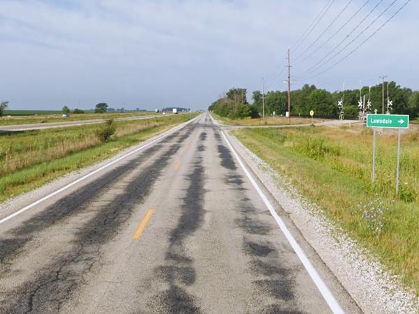 US66 in Lawndale IL highway, grassy shoulders sign reads LAWNDALE