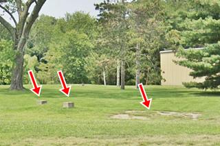 concrete pillar bases and foundations in a field
