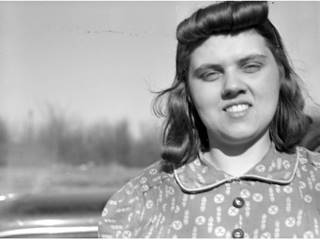 Clotis Lamkin 1942, US66 Black and white, 1942, Clotis Lamkin, a woman owner of a gas station in Lexington Illinois