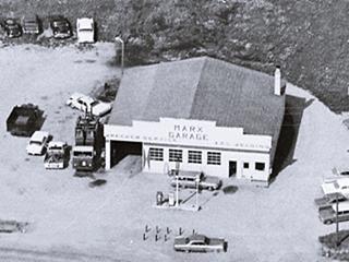 aerial view 1968 Marx Garage US 66, Dwight Il Black and white, 1968 aerial view of gas station and garage on US66, cars
