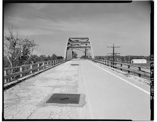 Route 66 on the Mazon River steel bridge US66 US 66 highway crosses a steel bridge, black and white c.1970