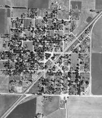 1940 aerial view McLean IL black and white photo of a village, streets and fields with US66