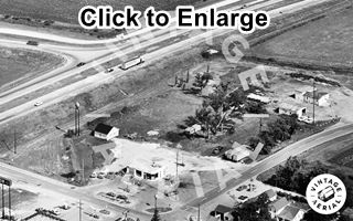 aerial view 1972 IL-17 and US 66 Dwight Il Black and white, 1972 aerial view of gas stations on a crossroads of US66 and IL-17, cars