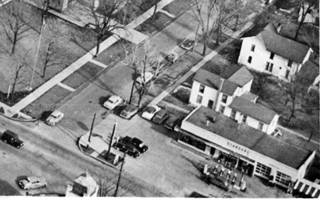 aerial view Plainfield Route 66 and Lockport Rd. c.1950s Black and white, 1950s aerial photo crossroads in downtown Plainfield, with Reichert Standard gas station lower right, cars and homes