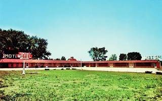 Pontiac Motel c.1960s color postcard, single story gable roof PONTIAC MOTEL, lawn, signs, trees beyond