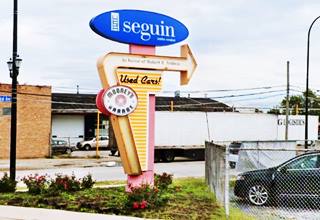 googie inspired retro neon sign, with angles, ovals, and glaring colors