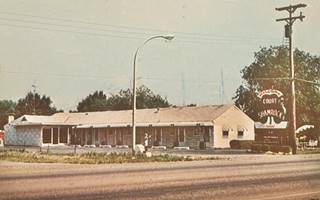 Shamrock Motel postcard in Springfield gable roof single story Shamrock Motel postcard