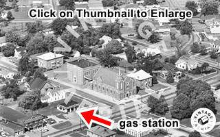 1967 aerial photo of Gillespie IL black and white aerial photo of streets, church and gas station