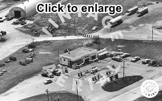 Standard Station, aerial view 1965 Gardner US66 black and white 1965 aerial view of a building and parking a Standard Station