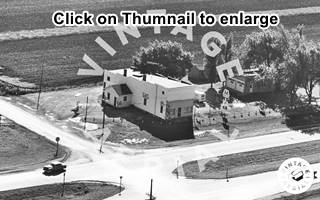 1966 aerial photo Marathon station US66 Divenon trees and building by 4-lane 66 black and white 1966 aerial photo