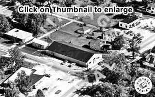 1967 aerial photo Virden IL black and white aerial photo of streets, houses and a gas station