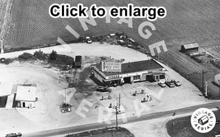 Texaco Station, aerial view 1965 Gardner US66 black and white 1965 aerial view of a building and parking a Standard Station
