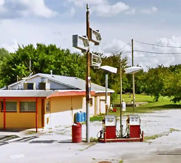 Old Gas Station Old Gas Station, pumps and broken neon sign