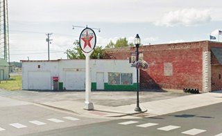 old Texaco station with sign