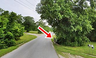 state line at Galena nowadays US 66 bridge over creek by trees at KS MO state line