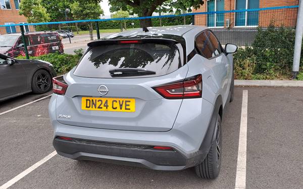 Nissan Juke, gray, in a car park with UK license plate