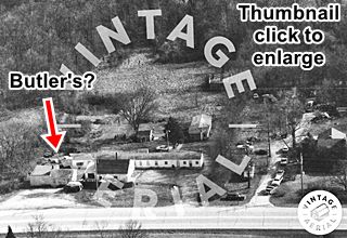 black and white aerial photo motel and cafe and US66 in front