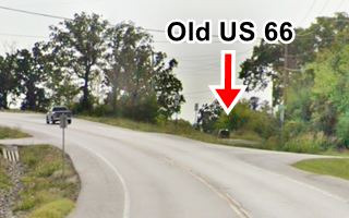 highway, trees and homes in St. Clair