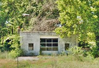 abandoned garage in the trees