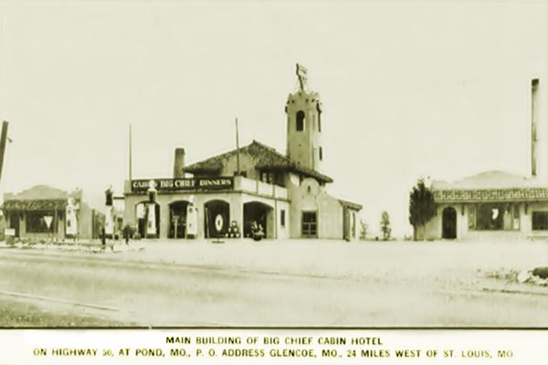 1930s postcard of hotel and gas station