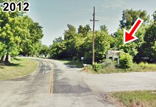 old gas station in the trees