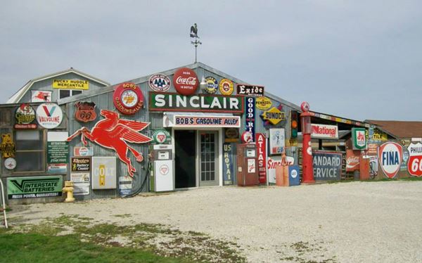 Shed with enamel signs and gas pumps of the 50s and 60s
