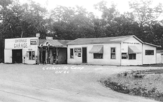 1930s view of garage and gas station, black and white photo