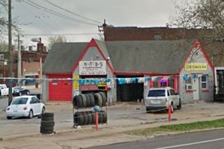 Cottage style station cottage gas station on a corner