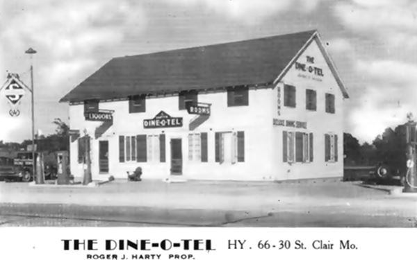black and white postcard 1930s hotel gable roof two floor woodframe building facing Route 66
