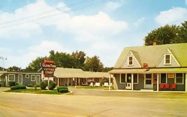 Glenstone Cottage Court motel postcard color 1950s postcard Glenstone Cottage Court gable roof buildings