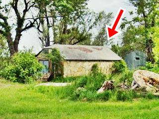 stone cabin with gable roof