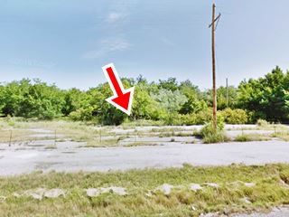 site of old gas station in the trees