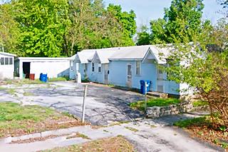 color view of gabled roof cabins