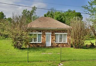 stone building, hipped roof