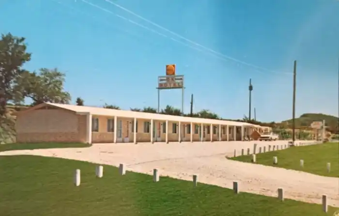 1960s color, motel, gable roof, 1 floor