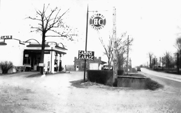 black and white picture highway, canopy, pumps and filling station, c.1930s