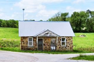 stone walls, gable roof 2-unit cabin