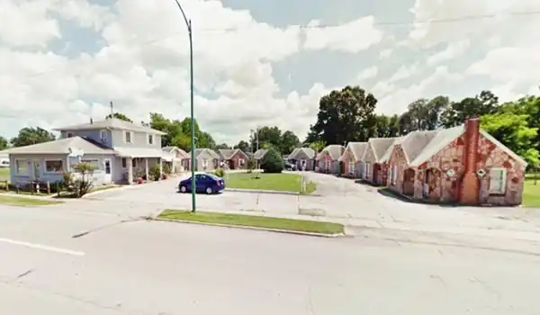 Historic Rock Fountain Tourist Court nowadays motel in semi-circle of rock buildings